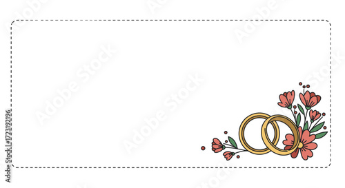 Wedding rings adorned with flowers in decorative corner design  
