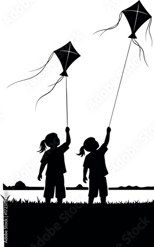 Two children flying kites in the sky high quality stock photo background perfect for creative commercial and editorial use.