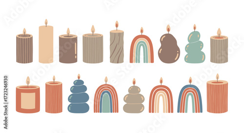 Collection of decorative candles in various shapes, sizes, and colors, some with rainbow designs, all with lit flames.
