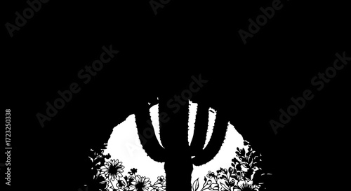 Vibrant desert flora bursts with life beneath a towering saguaro cactus silhouette, capturing arid beauty and resilience.