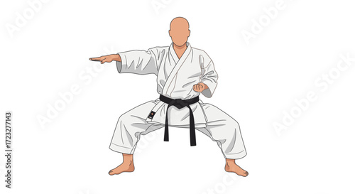 Karate practitioner stands in stance with uniform and focus gesture