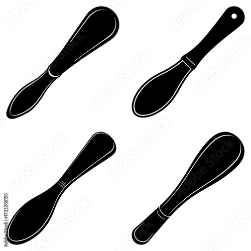 Illustration of four black butter spreaders with different handle designs on a white background