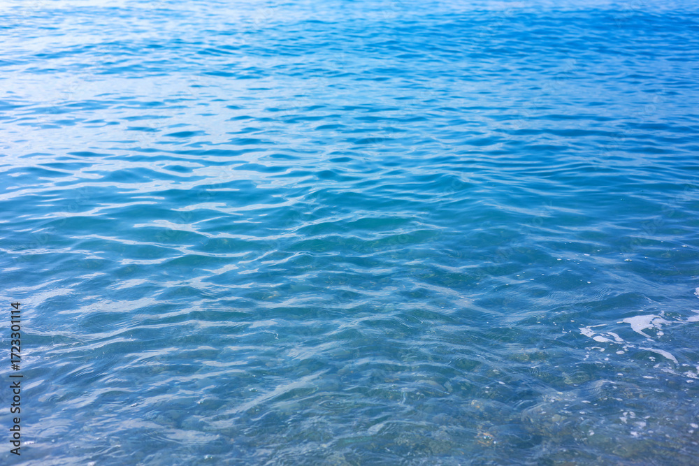 Fototapeta premium Clean wavy water on beach as background