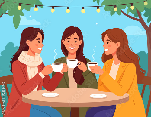 Three smiling young women sit at an outdoor cafe table, drinking coffee under string lights and trees.