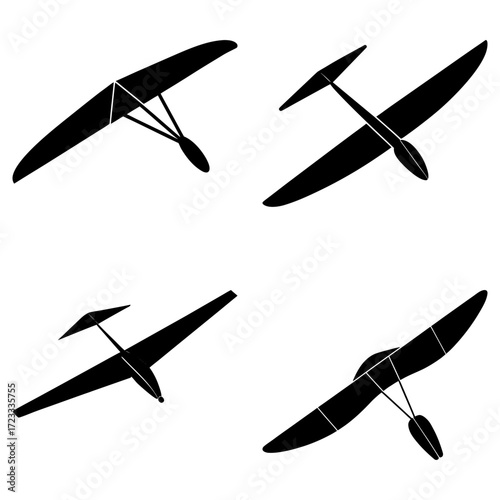 Four black and white silhouettes of different types of gliders in various orientations on white backdrop