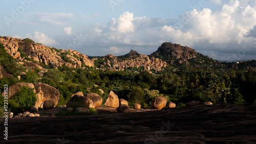 A dramatic view of Hampi's golden boulders just before the sunset.