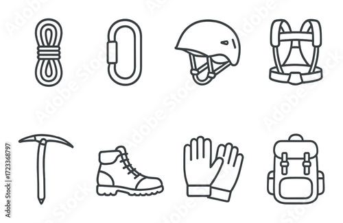 Essential outdoor gear: helmet, rope, ice axe, and backpack for climbing