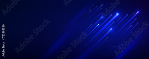 Blue light streaks on a dark abstract background