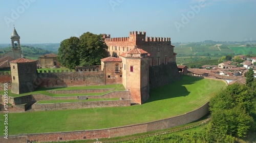Aerial view, taken by a drone, of the hills, villages and vineyards of Monferrato Region. Monferrato is an hilly area in Piedmont Region (Northen Italy), world famous for wines making and UNESCO Site.