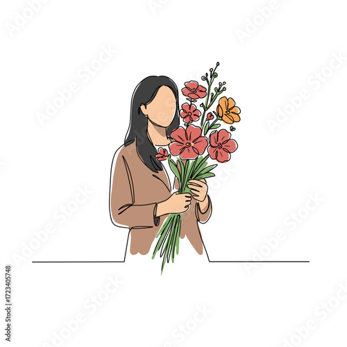 Woman holding bouquet of colorful flowers with relaxed expression  