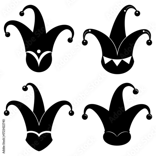 Four black jester hats with bells on the tips of the peaks in a symmetrical arrangement on white