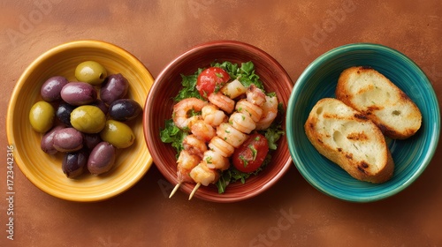Colorful Mediterranean Antipasto Platter Featuring Grilled Shrimp Skewers, Fresh Olives, Juicy Tomatoes, Crispy Bread Slices on a Rustic Wooden Table