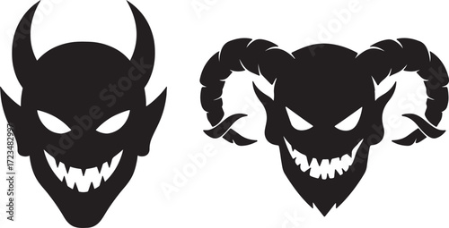 Two black silhouette demon faces with sharp teeth and glowing eyes.