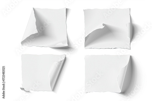 Wallpaper Mural Four square pieces of white paper with irregular, torn edges and curled corners, presented against a plain white background Torontodigital.ca