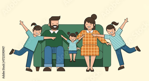 Happy family of four sitting on a couch with two daughters.