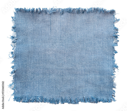 Piece of torn denim on a white background. Denim texture