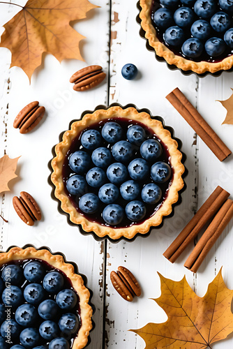 Blueberry Pie with Autumn Leaves and Cinnamon – Cozy Fall Dessert Still Life