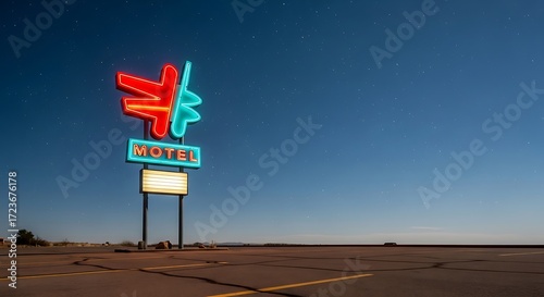 Vintage Motel Sign Aglow Under the Night Sky in the Desert