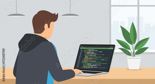 Man Coding on Laptop with Plant