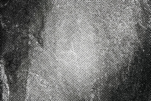 A close-up, high-contrast, black and white textured background with a subtle gradient effect.
