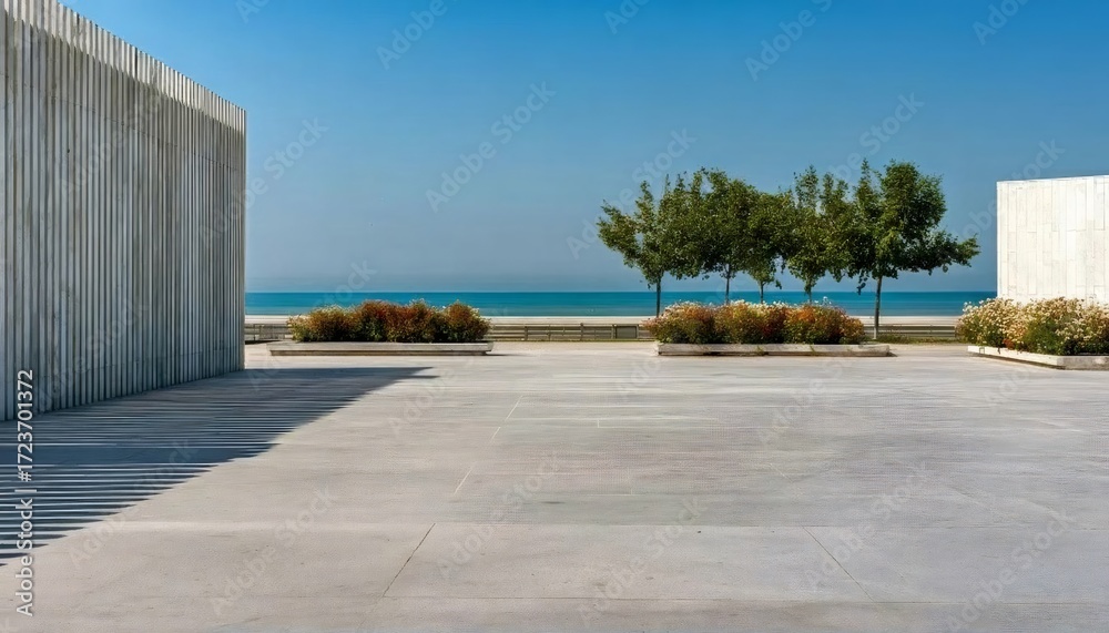 Fototapeta premium 木々と青い空のある海辺の空き地