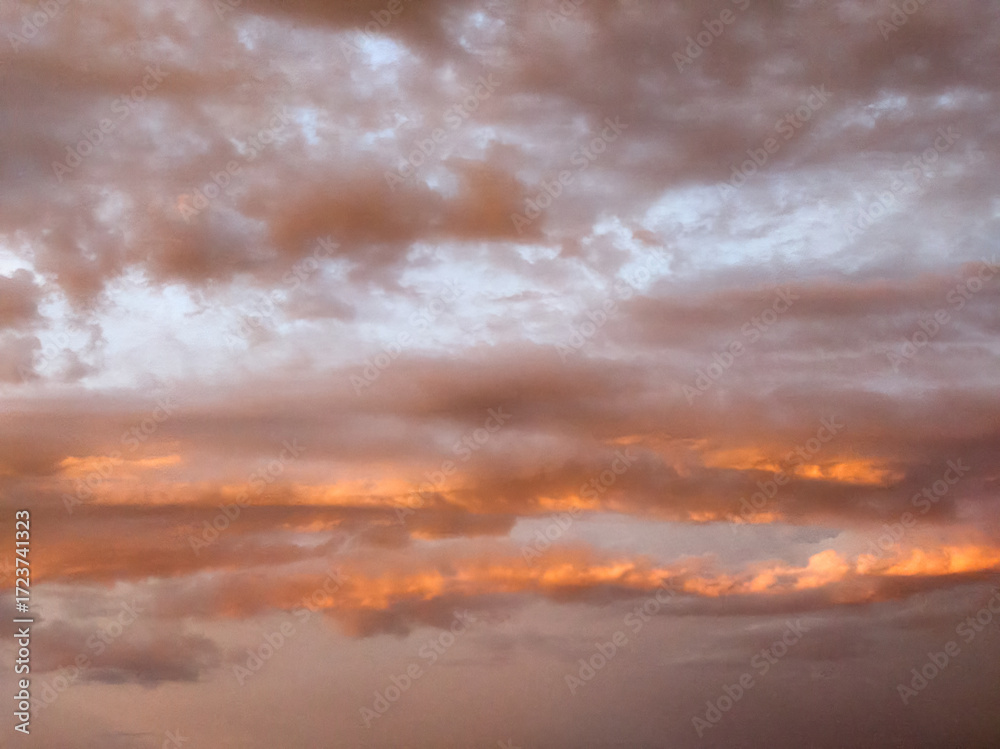 Obraz premium Evening sky. Summer, the sun is already at the horizon, softly illuminating the clouds, a beautiful landscape of the sky,