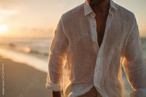 Man in Linen Shirt at Sunset on Beach.