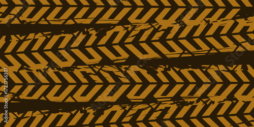 Dark background with brown tire track pattern created using brush stroke effect as abstract texture design for automotive, racing, and urban street style artwork.