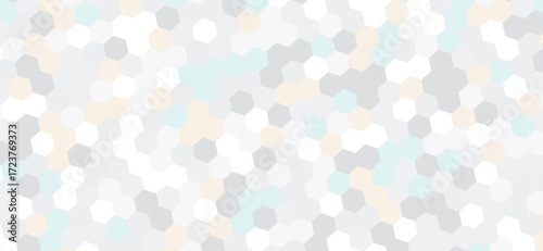 A seamless pattern showcases a blend of light grey, white, beige, and pale blue hexagons, creating a modern, geometric mosaic with a subtle and calming aesthetic