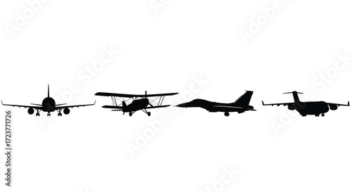 Collection of silhouetted aircraft including biplane fighter jet and commercial airliner vector