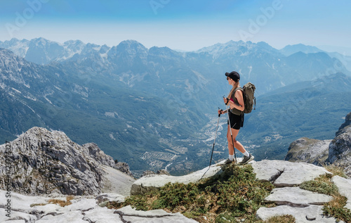 Young Woman Hiking in Albanian Alps Mountains