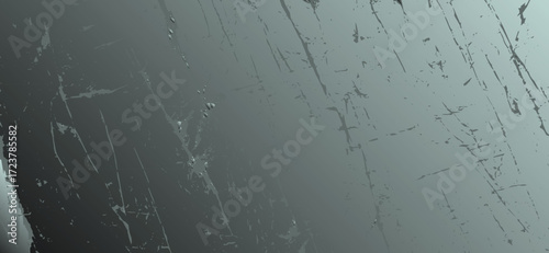 Monochrome background features a gradient from light to dark gray, marked with angular etched lines and abstract scuff marks creating a textured, industrial feel