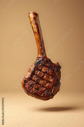 Grilled Tomahawk Steak Levitation on Neutral Plain Background
