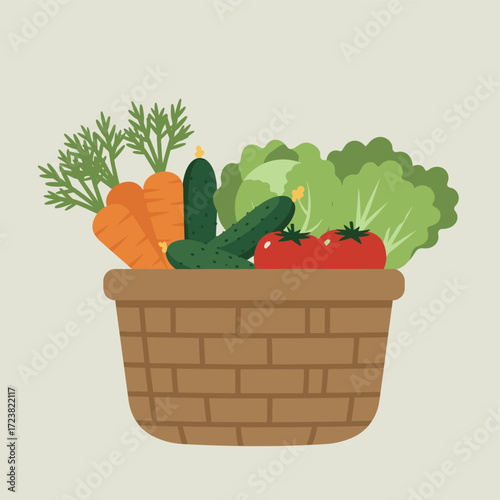 Basket with fresh vegetables, carrots, cucumbers, tomatoes and lettuce.  healthy food.