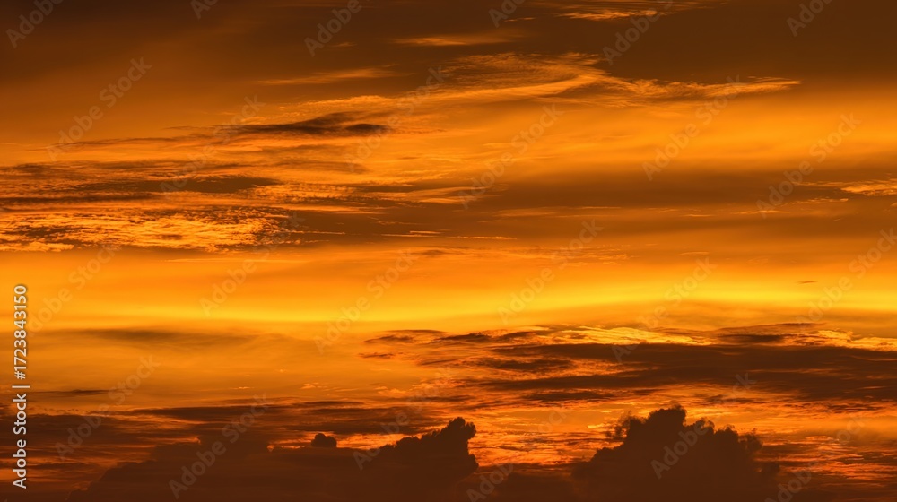 Fototapeta premium peace. A breathtaking sunset sky panorama with vibrant warm hues and glowing clouds. inspiring travel planning, travel magazines, designed for travel destination branding, inspires travel planning.