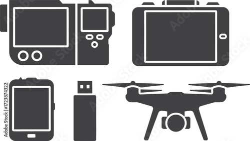 Collection of modern electronic devices including a drone camera and smartphone