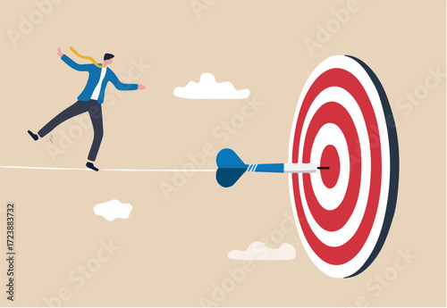 Challenge to overcome difficulty and achieve business target, risk management or strategy and skill to win and success concept, skillful businessman acrobat walk on rope to reach bullseye dart target.