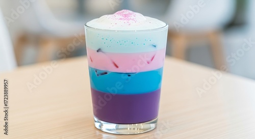 Wallpaper Mural Vibrant layered drink with creamy foam and purple, blue, and pink hues Torontodigital.ca
