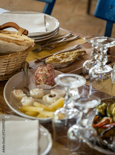 Casu Marzu, Sardinian cheese with larvae of Piophila Casei, served on a traditional Sardinian table together with other local and artisanal products
