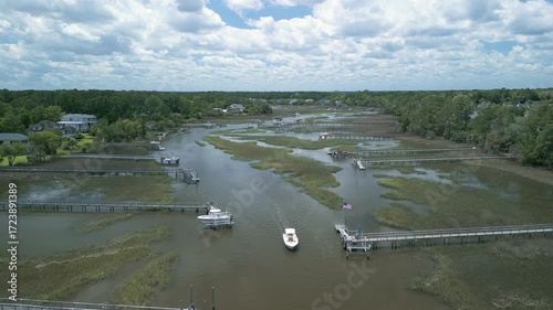 Expensive boat in low country marsh during the day