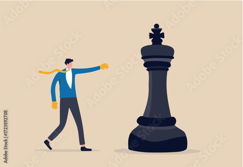 Challenge and strategy to win business competition, tactic, skill and leadership to win rivalry battle, plan to knock out competitor concept, businessman with boxing glove fight with big chess king.
