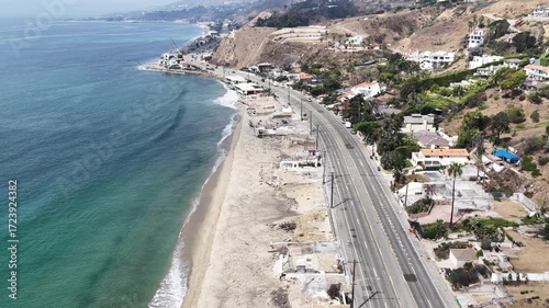 Aerial drone shot of the L.A. fires that burnt and damaged homes along pacific coast highway or PCH in Malibu Los Angeles, California.