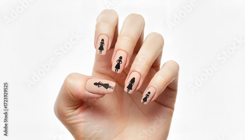 Woman showing stylish nail art with black silhouettes on fingers  