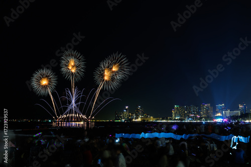 PATTAYA, THAILAND, Real Fireworks at Pattaya bay, Pattaya national Fireworks Festival contest, November of every Year, Beautiful of bright light fireworks Show in middle sea, for postcard wallpaper