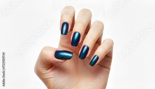 Woman's hand displaying manicure with blue metallic nails  