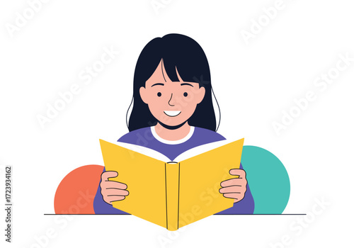 A young girl reads a yellow book with colorful circles behind her.