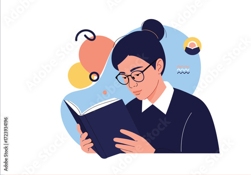 A person wearing glasses is reading a book attentively.