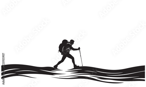 Silhouette of a Hiker Trekking with a Backpack and Pole on an Outdoor Trail