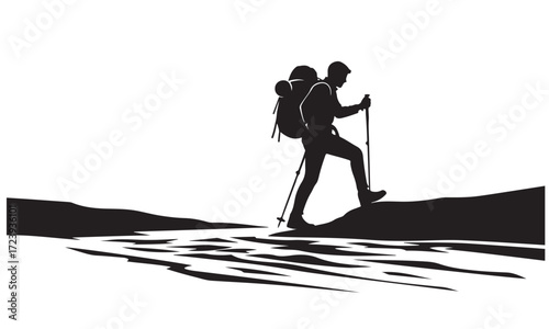 Hiker Silhouette with Backpack and Trekking Poles on Mountainous Terrain