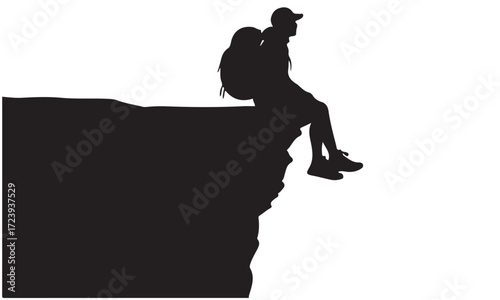Silhouette of Adventurer Sitting on Cliff Edge with Backpack